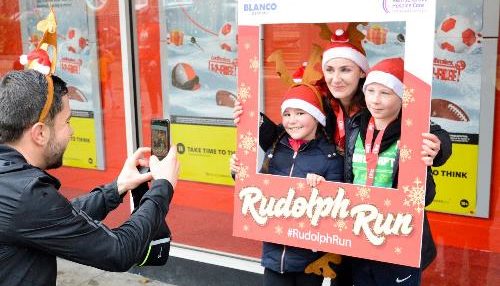 Rudolph runners commemorate their run with a framed picture