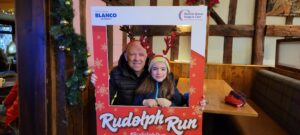 Father and daughter in Rudolph Run frame